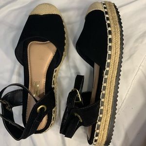 Black and beige sandals